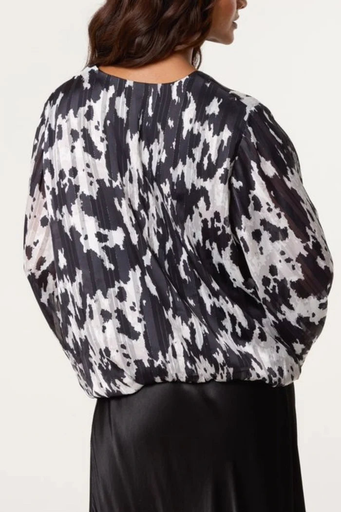Cow Print Bubble Hem Top